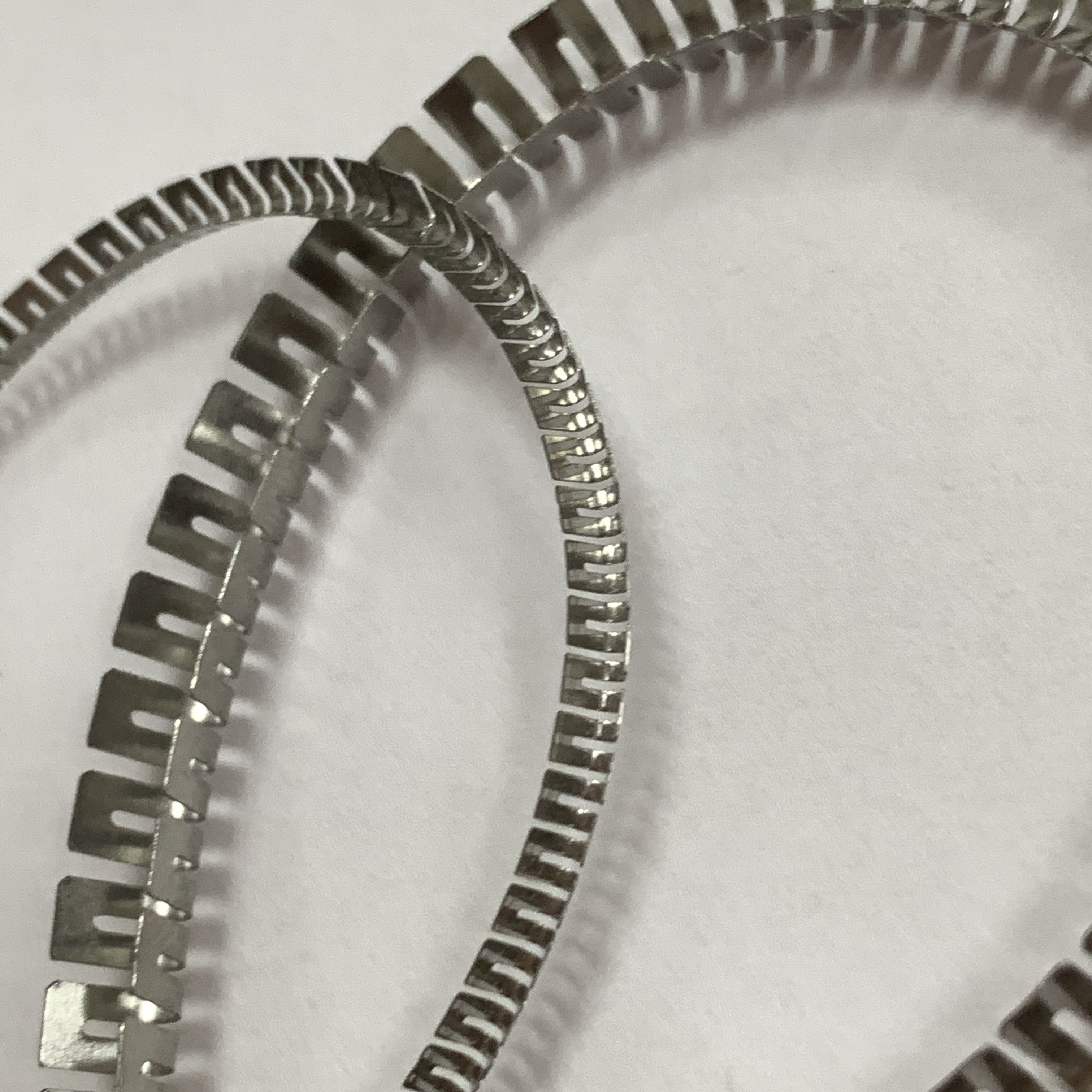 The function of V-shaped spring on the plug seal