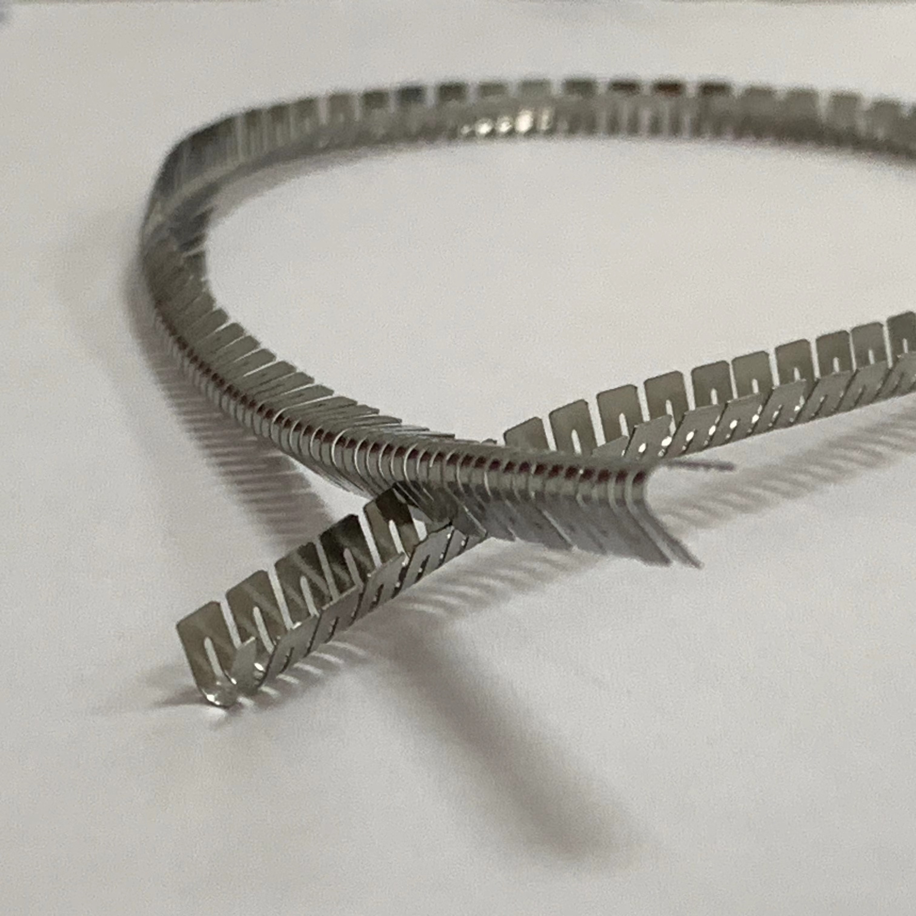 What are the characteristics and advantages of cantilever V-spring?
