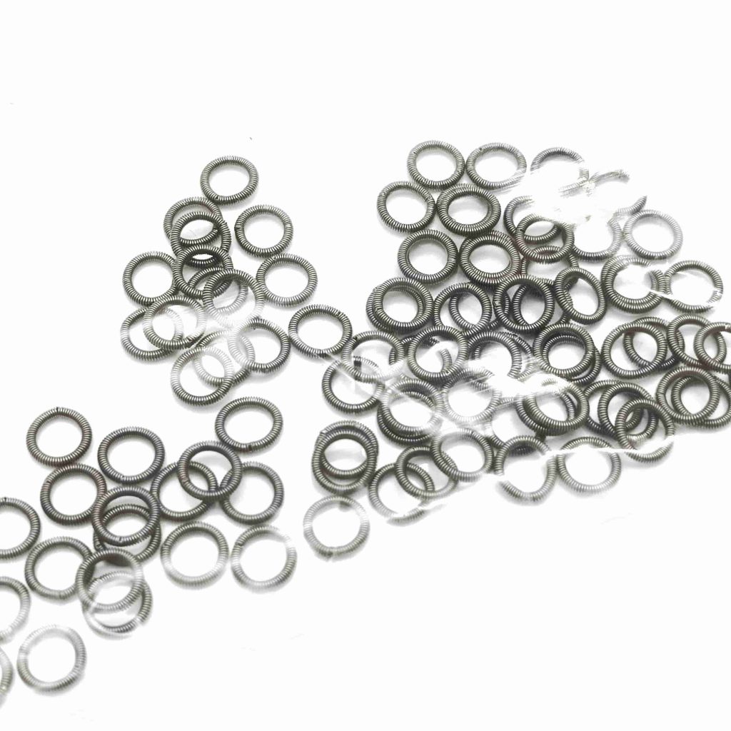 High-Temperature Performance Limits of Canted Coil Springs